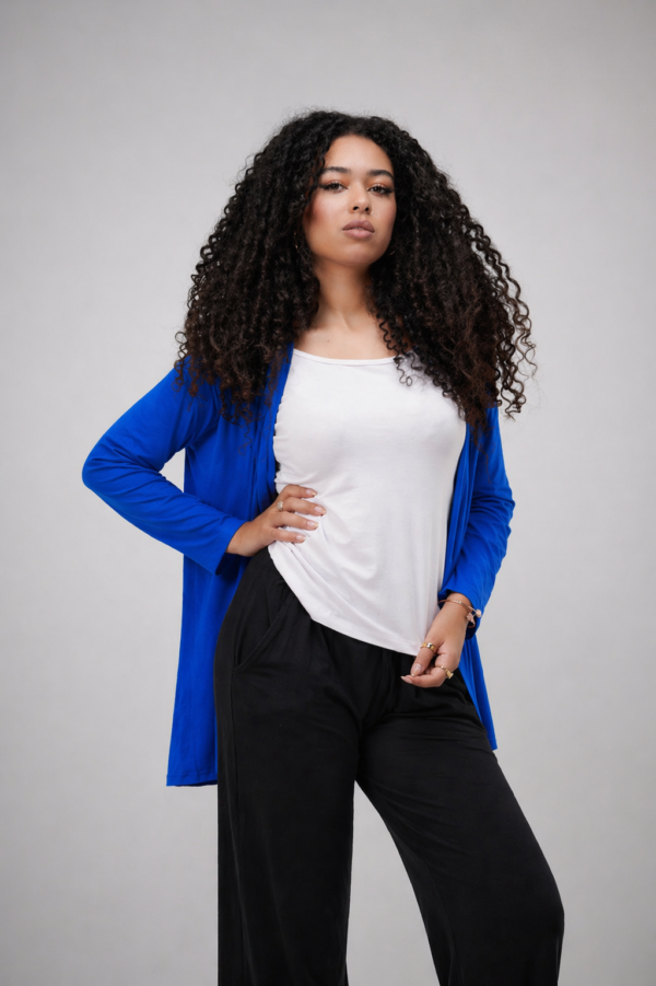 Cardegan with two holes of the grass.