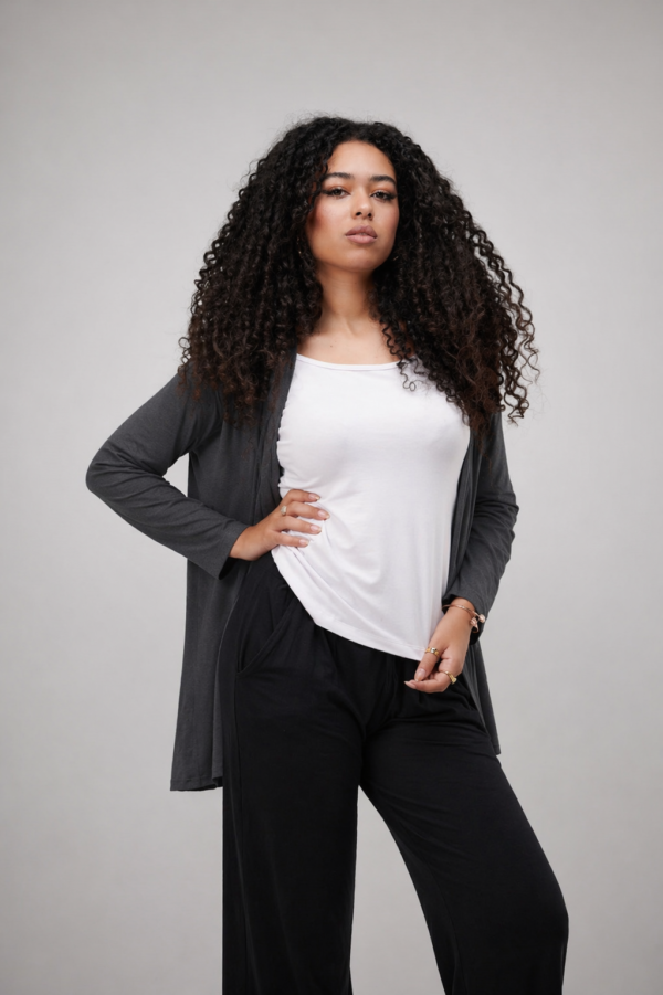 Cardegan with two holes of the grass.